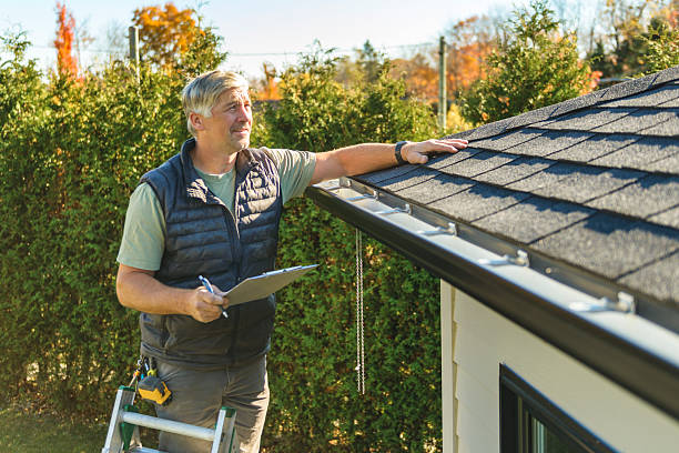 Professional Roof Replacement technician working in Fresno, CA